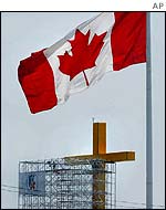 Cross and Canadian flag