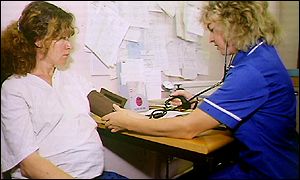 Pregnant woman being monitored