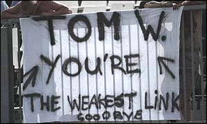 Arrows boss Tom Walkinshaw is sent a message by fans at the French Grand Prix