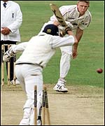 Peter Martin bowls Matthew Wood