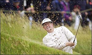 Colin Montgomerie breaks the course record with a superb seven under par round of 64y