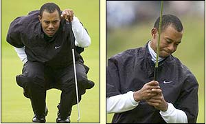 Woods lines up a putt on the ninth and reacts when the shot misses the hole 