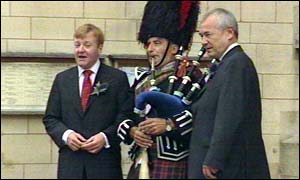 Charles Kennedy and Lord Razzall with the piper