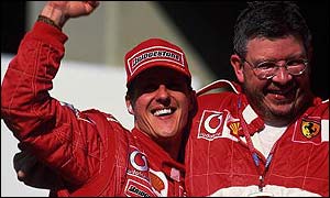 Michael Schumacher celebrates with Ferrari technical director Ross Brawn