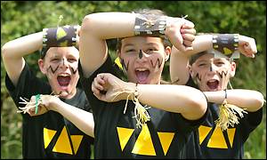 Pippa Blything leads the Haka, a Maori dance with Duncan Chaplin (L) and Jack Pollard (R), all from Tarvin Primary school in Cheshire.