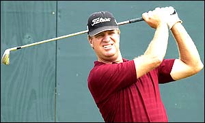 Australia's Steve Elkington watches his shot 