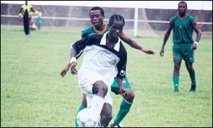 Doe (in white) is the Liberian import of Tonnerre Yaounde