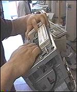 a computer hard drive being recycled