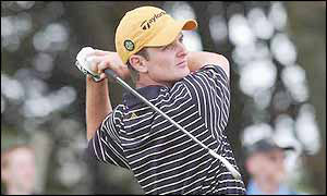 Justin Rose holds his follow-through