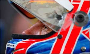 Jenson Button waits in his car before this year's Monaco Grand Prix