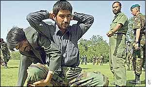 Afghan bodyguards being trained by ISAF instructors