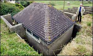 Estate agent Gordon Cockfield outside the toilets