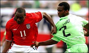 Joseph Yobo (left) in World Cup action against England