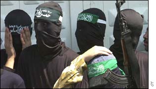 Hooded Hamas members at funerals
