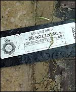 A drainage cover with a police security seal