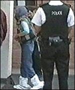 Officials enter the mosque