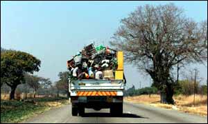 Farmers on truck in Zimbabwe