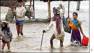 Assam villagers abandon flooded home