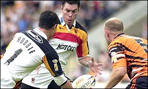 Robbie Paul feeds Michael Withers