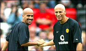 Rio Ferdinand trains with his new team-mate Juan Sebastian Veron 