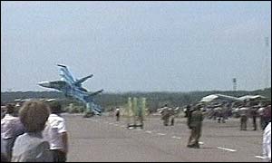 Su-27 skids along surface of airfield