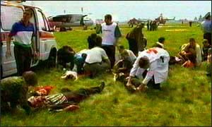 Emergency workers tend to the injured