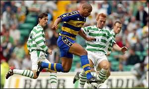 Celtic defenders Jackie McNamara and Stephen Crainey keep tabs on Adriano