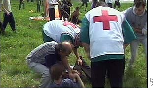 Medics tend a wounded victim