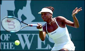 Venus Williams returns the ball