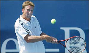 American Jan-Michael Gambill keeps his eye on the ball