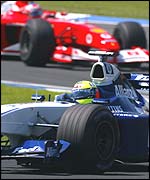Ralf Schumacher finished third, while Rubens Barrichello dropped back to fourth after a refuelling problem