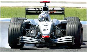 Tyre problems for McLaren see David Coulthard manage only a fifth place; team-mate Kimi Raikkonen retired