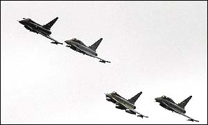 Four RAF Eurofighters fly in a display 