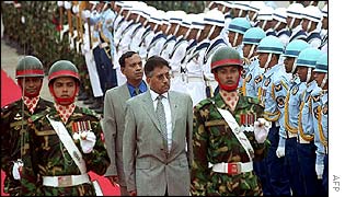 Musharraf reviews honour guard on Monday