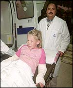 A young girl is taken to hospital after the blast in la Ghriba synagogue on 11 April