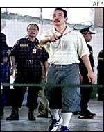 Tommy Suharto playing badminton in prison