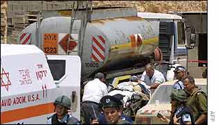 A victim is taken away on a stretcher