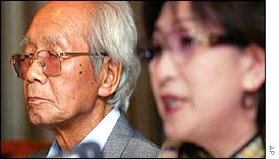 Yoshio Shinozuka (left) at Japan's Foreign Correspondents Club