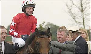 200 yards to go and Rock of Gibraltar bursts through the pack for a two length win and a place in history