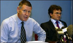 SPL chairman Lex Gold and chief executive Roger Mitchell announce the deal