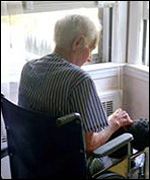 Elderly man in wheelchair