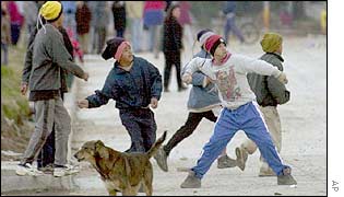 Uruguayan protesters throw stones