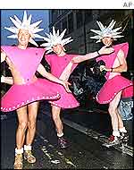 Men display their pink costumes before the start of the Gay and Lesbian Mardi Gras 1995 parade in Sydney