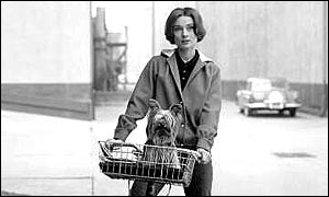 Audrey Hepburn and dog Famous at Paramount Studios, 1957