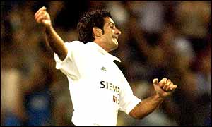 Luis Figo celebrates his goal against Liverpool