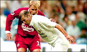 Zinedine Zidane uses his skills to leave Stephane Henchoz stranded