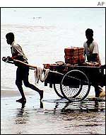 Assam villagers abandon flooded home