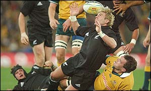 New Zealand's Justin Marshall loses the ball in the tackle