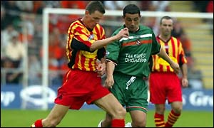 Thistle's Martin Hardie (left) and United's Charlie Miller