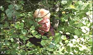 Peter Hedblom tries to play out of the shrubbery